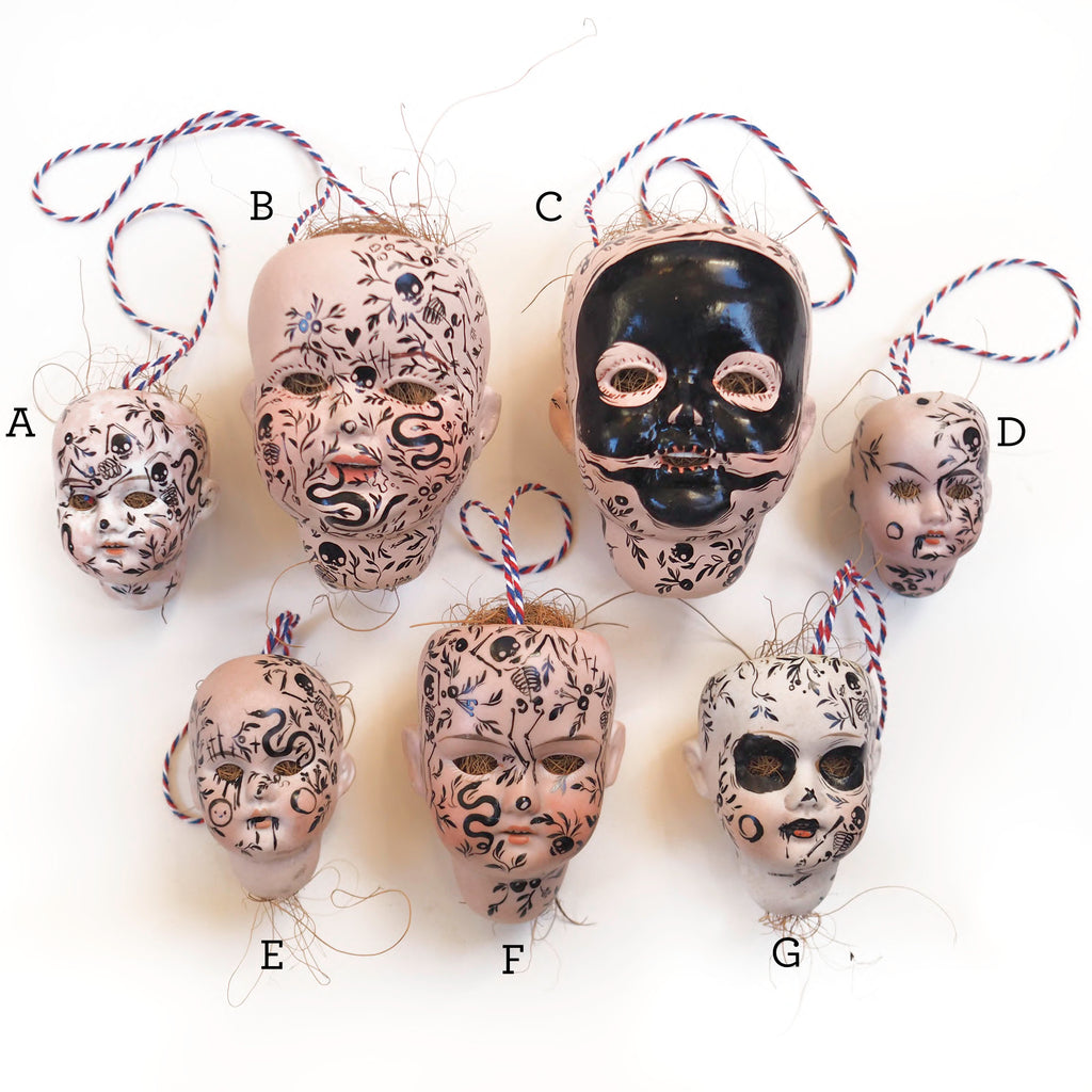 Tattooed Doll Heads A - G